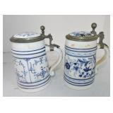 Lot of 2 blue & white steins, damage to one lid