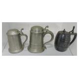 Lot of 2 pewter and 1 silverplate stein
