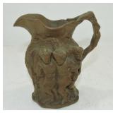 English molded jug with figures, 6"