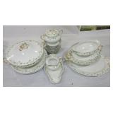 Limoge partial set of dinnerware