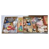 Large lot of small dolls