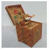 Mechanical wooden box with bird cigarette