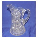 Cut glass water pitcher, 9', rim nick