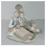 Lladro figure of boy and girl with puppy, 6'