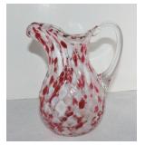 Cranberry spatter hand blown 7 1/2" pitcher