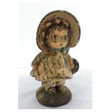 Cast iron girl with bonnet bank, 7 1/2"