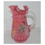 Cranberry floral enameld pitcher, 10"