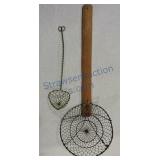 Two primitive wire strainers