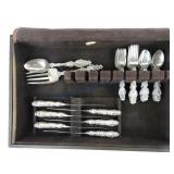 Sterling silver set of flatware: 6 dinner knives,