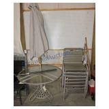 Patio table with umbrella and 6 chairs