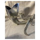 Ram horn candleholders and silver vase
