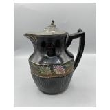 The height is 8 inches, has a 6 inch diameter at