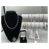 Lot of costume jewelry both bracelets stamped