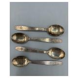 Set of four mini spoons stamped Sweden and extra