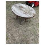 Nice round cedar outdoor table, measures 27