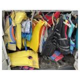 Lot of 17 life jackets of various sizes. Storage
