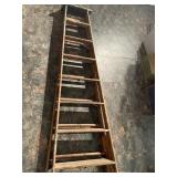 Wooden ladder stands 98 inches tall and is