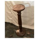 Wooden plant stand is 27 1/2 inches tall top is 9
