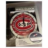 New in the box- Huskies Officially Licensed clock