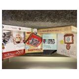 Assortment of scrapbooking technique books,