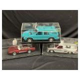 Model cars in display cases.