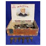 Cigar box with keys and other small items