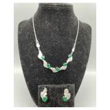 Earrings and necklace set a van well. Jewelry