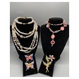 Assortment of costume jewelry including pearl