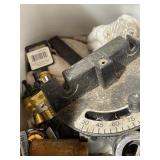 Garage lot with several new parts in it for hoses