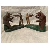 This is a Shoot A Bear mechanical coin bank. This