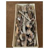 Tray of silverware includes wine bottle opener