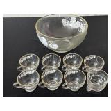 Punch bowl with seven matching cups and one mix