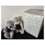 Boy and girl porcelain dolls