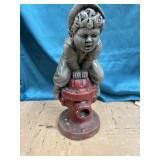 Very heavy lawn ornament boy jumping over fire