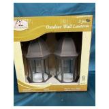 Two outdoor wall lanterns, antique rust finish,