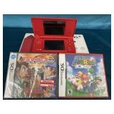 Red Nintendo DS with two games. Unknown