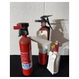 Three fire extinguishers all reading full