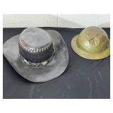 Leather Stetson and small metal helmet