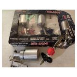 Spray guns, three are gravity fed and two of them