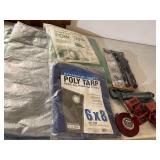 Three tarps, one is a 3