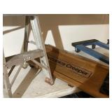 Garage lights consisting of mechanics creeper a