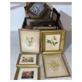 Box full of picture frames couple clocks are more
