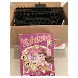 Plastic train track and Yahtzee jr Disney
