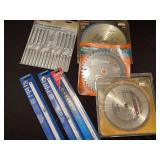 Several different types of sawblades including 25