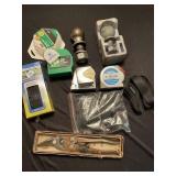 Garage lot With five tape measures ranging in