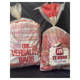 Two bags full of empty shotgun shells. All seem