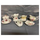 Assortment of cream and sugar holders