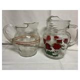 2 Large Painted Glass Pitchders