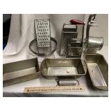 Kitchen lot with graders, baking pans and ore