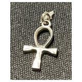 Sterling silver cross pendant.